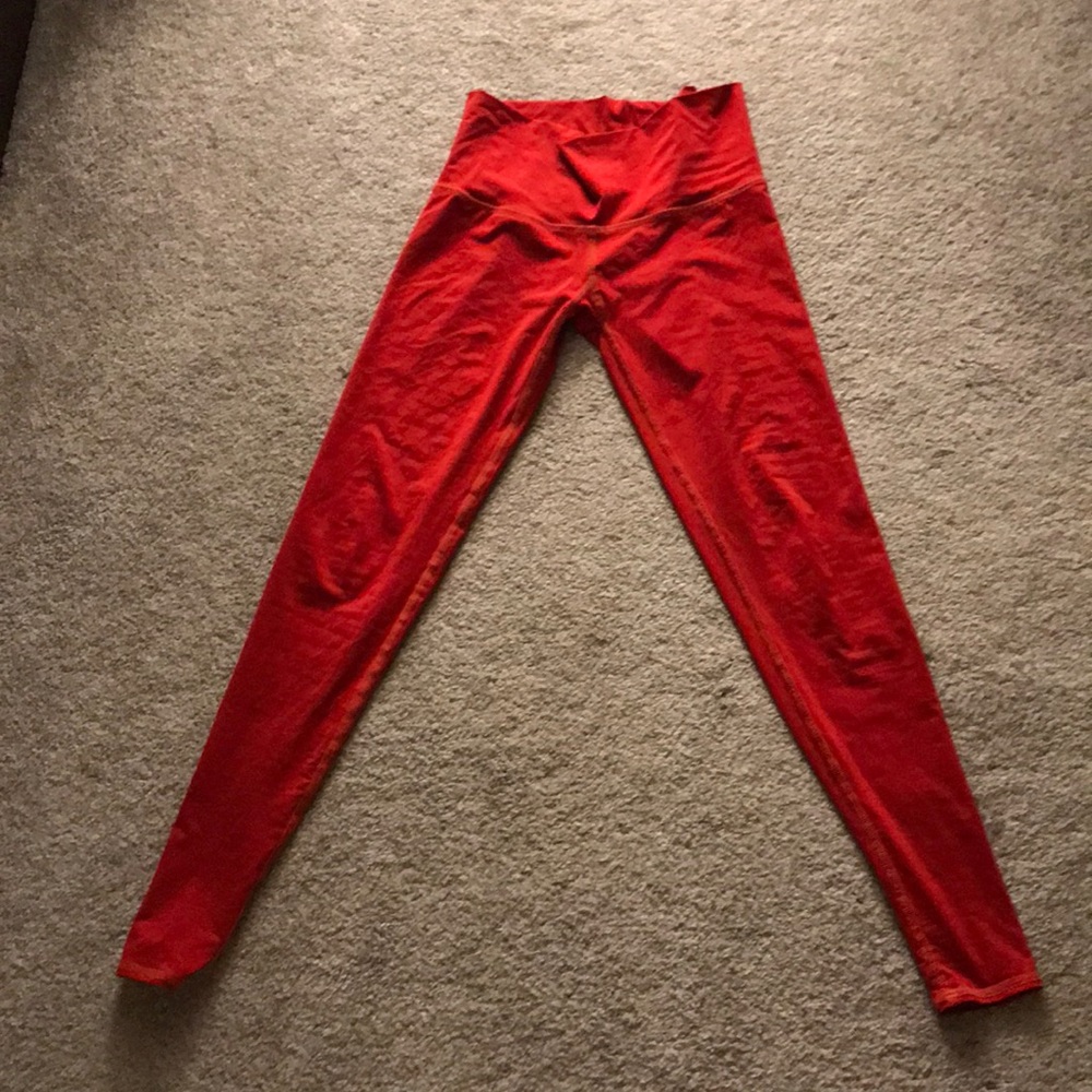 Red teeki leggings- size small